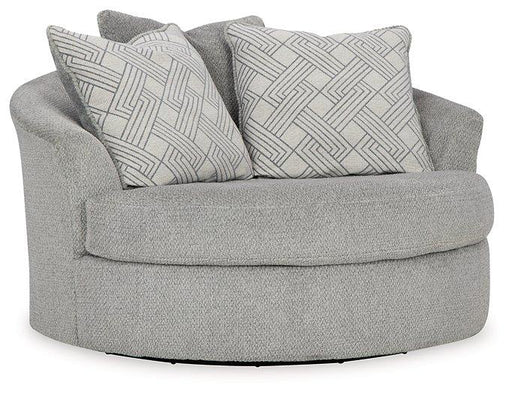 Oversized Ashley Furniture Casselbury swivel accent chair with plush upholstery and modern design, shown in a cozy living room setting.