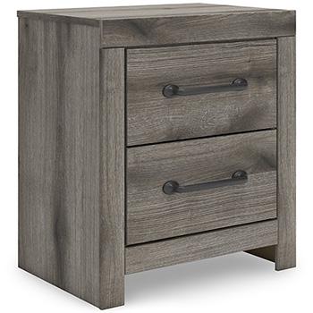 Graystorm bedroom set by Ashley Furniture, featuring a bed, nightstands, and matching dresser in a modern bedroom scene.