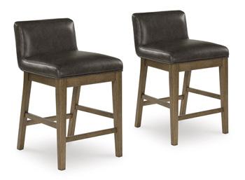Cabalynn counter height barstool by Ashley Furniture with wooden legs, upholstered seat, and backrest for a modern dining area.
