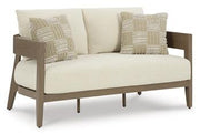 Outdoor seating set with cushioned chairs and a matching table by Ashley Furniture, perfect for patio or garden relaxation.