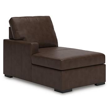 Ashley Furniture McDowlan sectional with double chaise, showcasing plush fabric and modern design in a spacious living room setting.