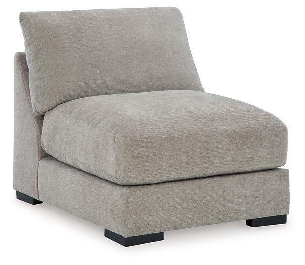 Ashley Furniture Aslan Court sectional sofa with plush cushions and modern design, shown in a stylish living room setting.