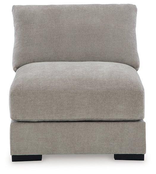 Ashley Furniture Aslan Court Sectional sofa with plush cushions and modern design, shown in a stylish living room setting.
