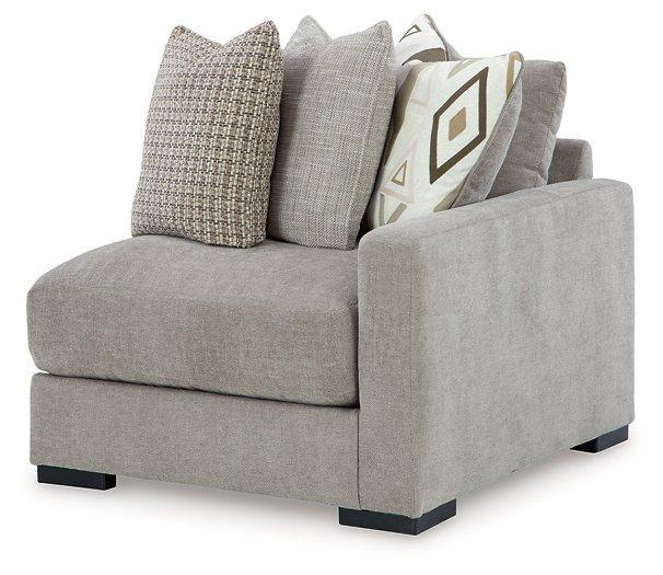 Ashley Furniture Aslan Court sectional sofa with plush cushions and modern design, shown in a stylish living room setting.