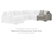 Ashley Furniture Aslan Court Sectional with plush fabric and modern design, shown in a spacious living room setting.