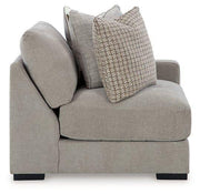 Ashley Furniture Aslan Court sectional sofa with plush fabric, featuring multiple seating areas and modern design.