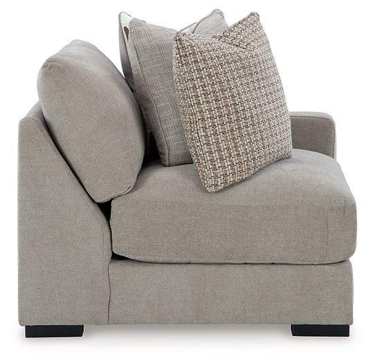 Ashley Furniture Aslan Court sectional sofa with plush fabric, featuring multiple seating areas and modern design.