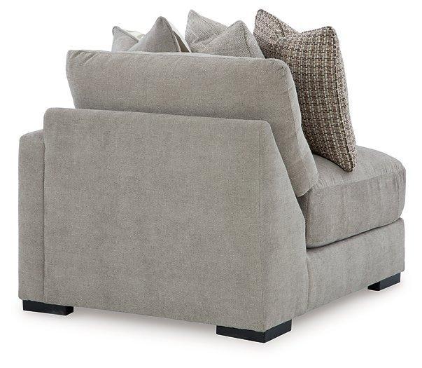 Ashley Furniture Aslan Court sectional sofa showing plush fabric, sectional design with multiple seating areas and modern style.