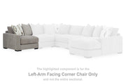 Ashley Furniture Aslan Court Sectional sofa with plush cushions and modern design in a cozy living room setting.