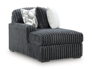 Ashley Furniture Midnight-Madness Super Chaise sectional in dark upholstery with plush cushions and modern design.