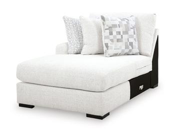 Misty-Lakes Super Chaise sectional sofa by Ashley Furniture with plush cushions and neutral fabric in a modern living room setting.