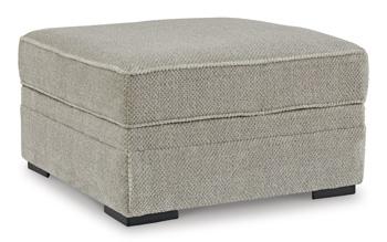 Ashley Furniture Calnita living room set with sofa and loveseat, featuring plush cushions and modern design in a cozy living space.
