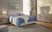 Ashley Furniture Culverbach dresser and mirror set with a sleek wooden dresser and matching mirror, showcasing elegant bedroom furniture.