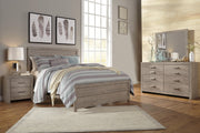 Ashley Furniture Culverbach youth bedroom set featuring a bed, dresser, and nightstand in a modern design.