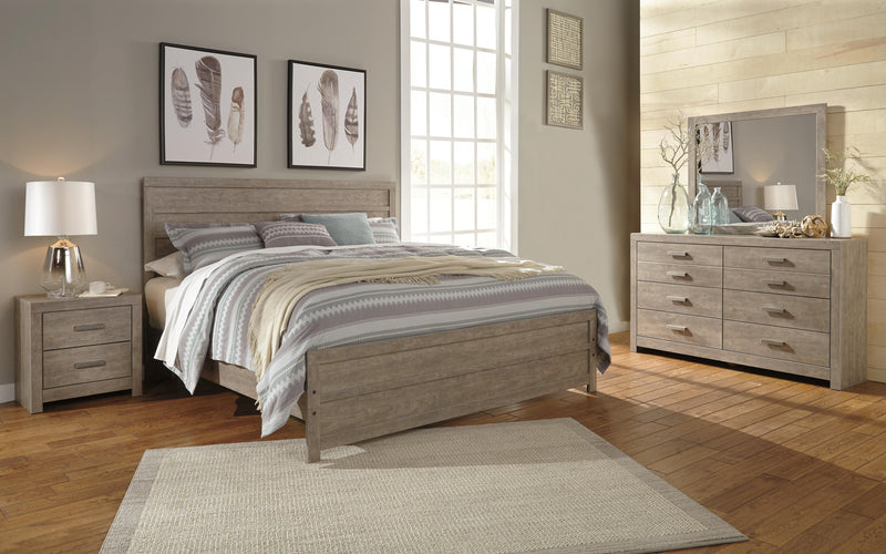 Ashley Furniture Culverbach youth bedroom set with matching bed, dresser, and nightstand in a modern bedroom layout.