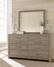 Ashley Furniture Culverbach youth bedroom set featuring a bed, dresser, and nightstand in a modern bedroom scene.