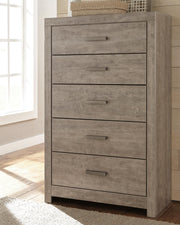 Ashley Furniture Culverbach Chest of Drawers with dark wood finish and four spacious drawers, showcasing elegant storage and classic design.