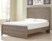 Ashley Furniture Culverbach youth bedroom set featuring a bed, dresser, and nightstand in a modern bedroom scene.