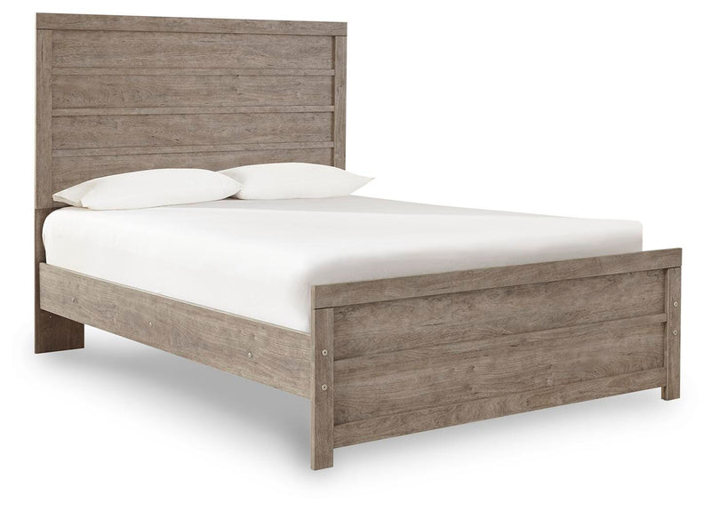 Ashley Furniture Culverbach Bed with a classic wood frame and elegant design, shown from an angled view in the image.
