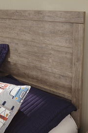 Ashley Furniture Culverbach Bed with elegant wood finish and detailed headboard design, showcasing a stylish bedroom centerpiece.