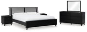 Ashley Furniture Danziar bedroom set featuring a modern bed frame, matching nightstands, and a coordinated bedroom furniture design.