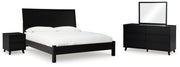 Ashley Furniture Danziar bedroom set with a modern bed frame, matching nightstands, and elegant design in a stylish bedroom scene.