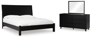 Ashley Furniture Danziar bedroom set featuring a bed frame, nightstands, and matching dresser in a modern design.
