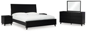 Ashley Furniture Danziar bedroom set with a modern bed frame and matching nightstands in a cozy bedroom setting.