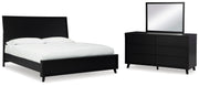 Ashley Furniture Danziar bedroom set featuring a bed frame, matching nightstands, and dresser in a modern design.
