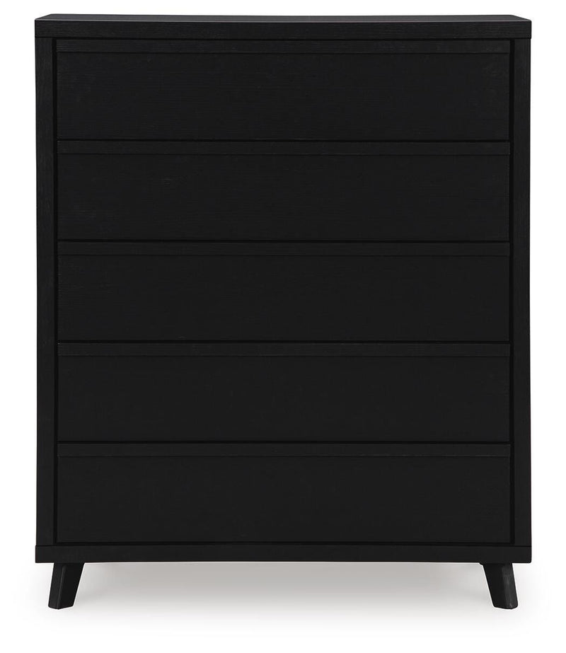 Ashley Furniture Danziar wide chest of drawers with sleek wood finish and multiple drawers, shown from a front head-on view.