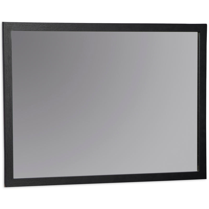 Ashley Furniture Danziar bedroom mirror with a sleek, modern design shown from an angled side view.