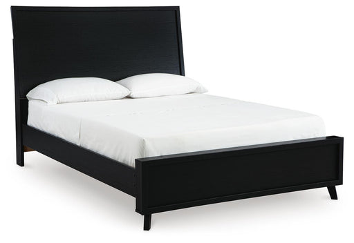 Ashley Furniture Danziar Bed in a modern design, shown from an angle highlighting the frame and headboard details.