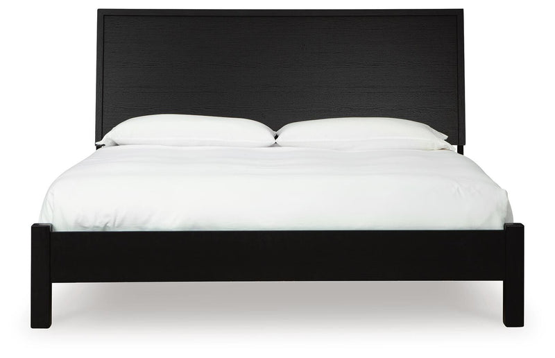 Ashley Furniture Danziar bedroom set with a modern bed frame, matching nightstands, and stylish bedroom decor.