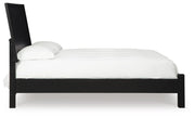 Ashley Furniture Danziar bedroom set featuring a modern bed frame, matching nightstands, and sleek bedroom furniture arrangement.