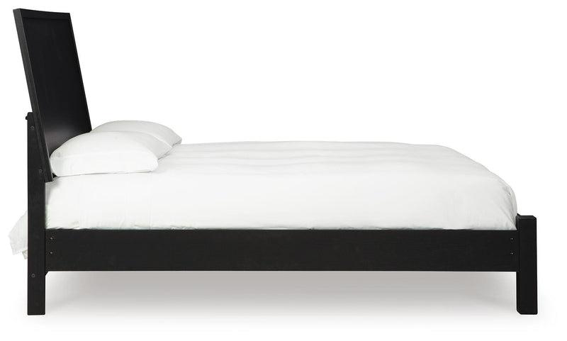 Ashley Furniture Danziar bedroom set featuring a modern bed frame, matching nightstands, and sleek bedroom furniture arrangement.