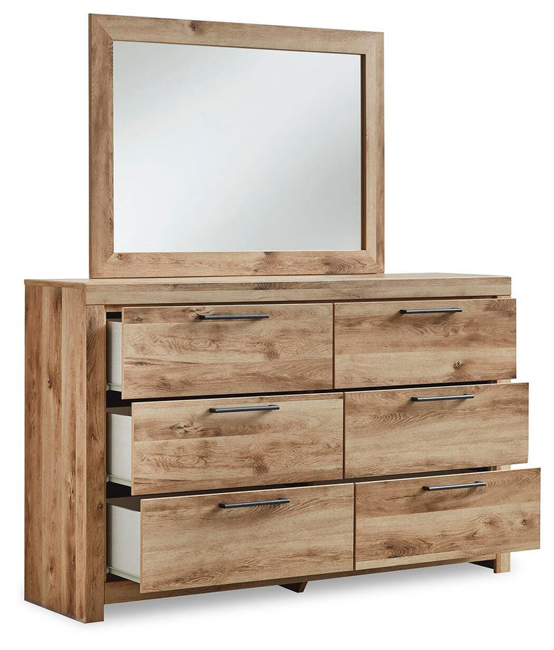 Ashley Furniture Hyanna dresser and mirror set with a spacious wooden dresser and matching mirror in a modern bedroom style.