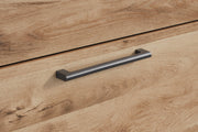 Close-up of the drawer handle on the Hyanna Dresser by Ashley Furniture, showing the detailed hardware design.