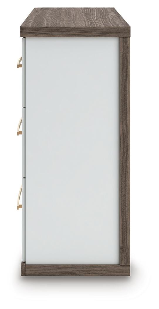 Ashley Furniture Kendanport Dresser with multiple drawers and a sleek wood finish, shown from the side angle.