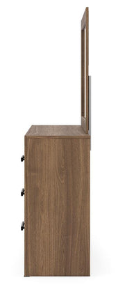 Ashley Furniture Broachmyn dresser with attached mirror, featuring a sleek wooden finish and modern design for bedroom storage.