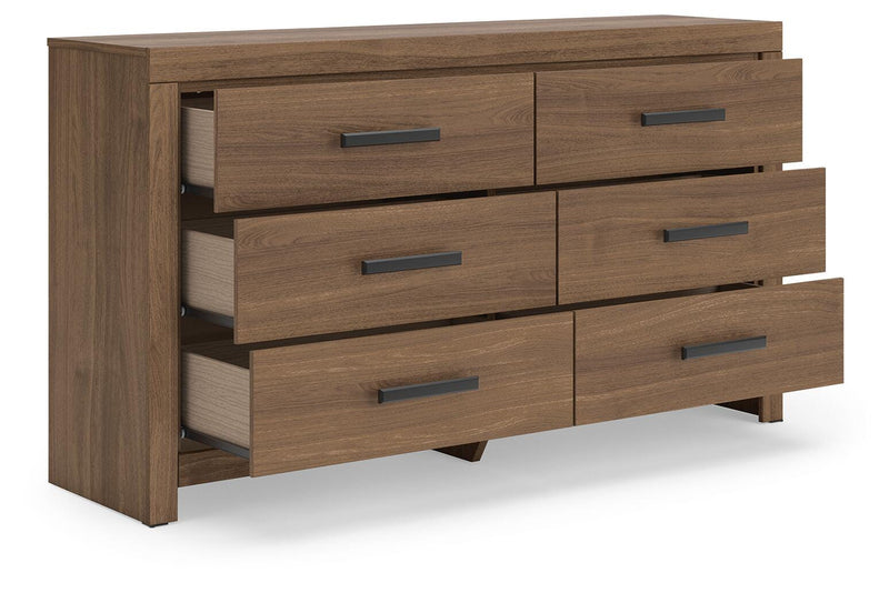 Ashley Furniture Broachmyn dresser with mirror, featuring a spacious wooden dresser and attached mirror, angled view.