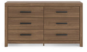 Ashley Furniture Broachmyn dresser and mirror set, featuring a sleek dresser with a matching mirror, in a contemporary bedroom style.