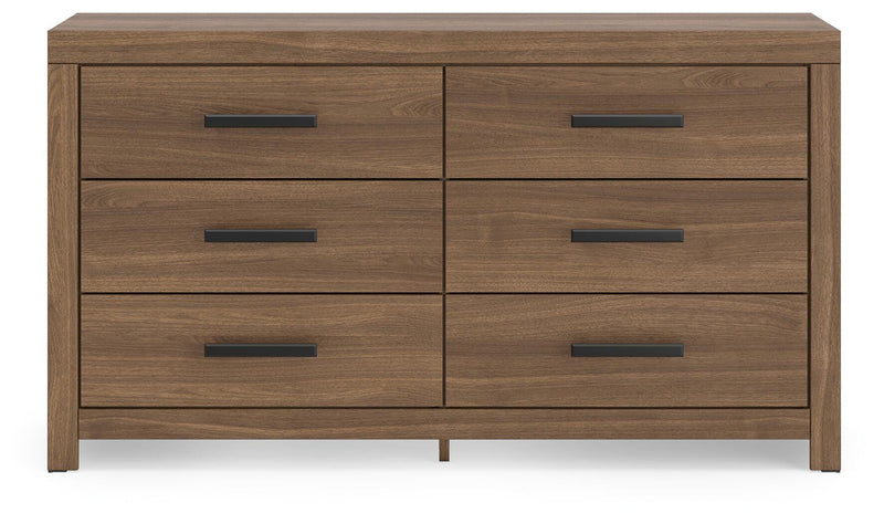 Ashley Furniture Broachmyn dresser and mirror set, featuring a sleek dresser with a matching mirror, in a contemporary bedroom style.