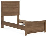 Ashley Furniture Broachmyn Bed with a stylish headboard and frame in a modern bedroom setting.