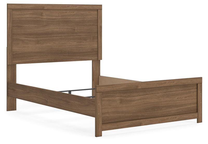 Ashley Furniture Broachmyn Bed with a stylish wooden frame and headboard, shown from an angled side view.