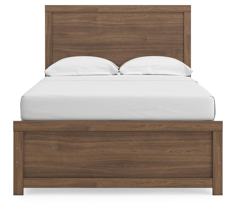 Ashley Furniture Broachmyn Bed with a tall upholstered headboard and dark wood finish, shown from a head-on angle.