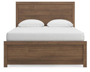 Ashley Furniture Broachmyn Bed with a headboard featuring intricate wood carvings in a dark finish.