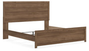 Ashley Furniture Broachmyn Bed shown from an angled view, featuring a sturdy wooden frame and detailed headboard design.