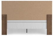 Ashley Furniture Broachmyn Bed in a stylish design, showcasing the headboard and rich wood finish.