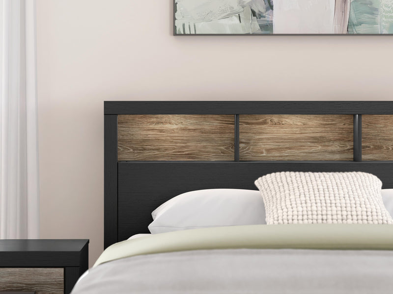 Ashley Furniture Broachmyn Bed with detailed headboard in a modern bedroom setting