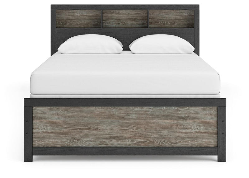 Ashley Furniture Broachmyn Bed with a headboard featuring a sleek, modern design in neutral tones.